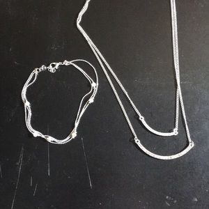 A Necklace with an anklet.